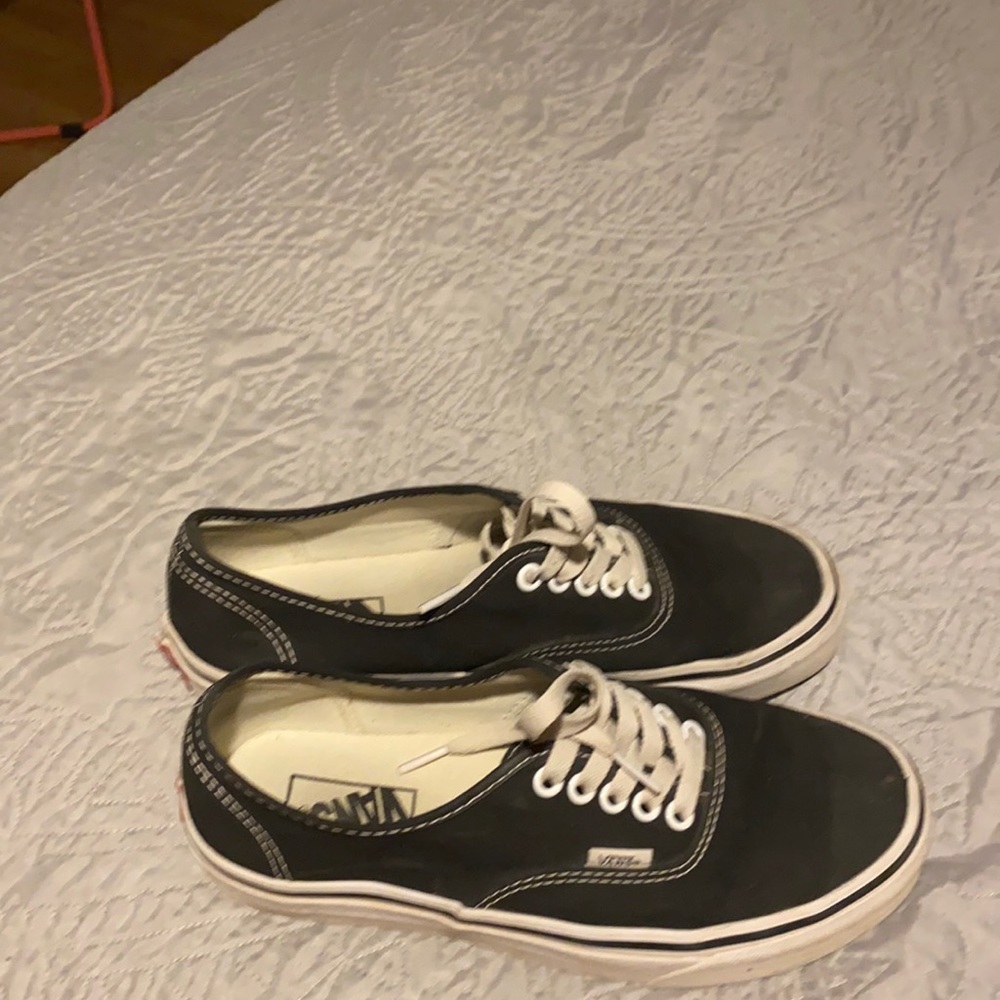 Black pair of Vans